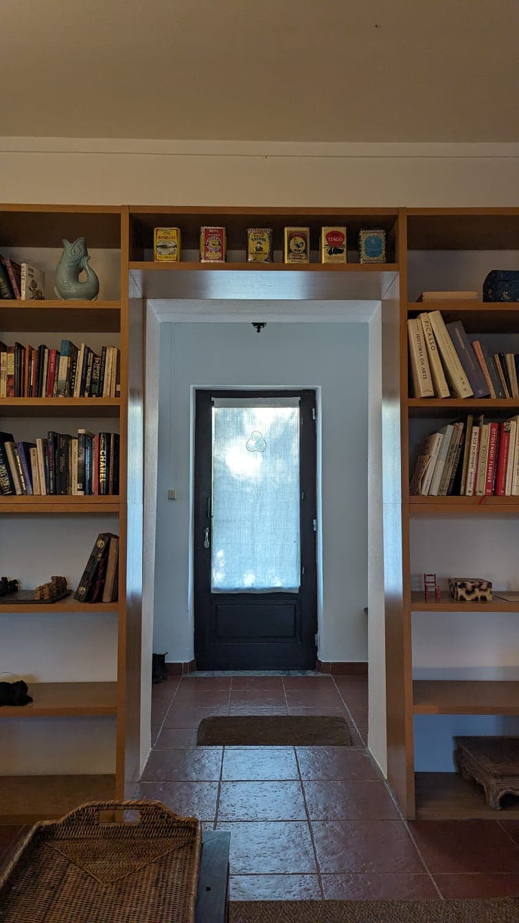 Library with terracotta tile floor